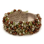 Green and  light green pearls, peridots and olivine crystals[604]