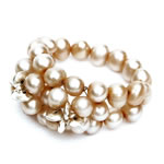 Copper pearls with silver discs[213]