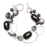 Black pearls, silver French loops, clear tumbled crystal, obsidian and black coin pearls.[3505]